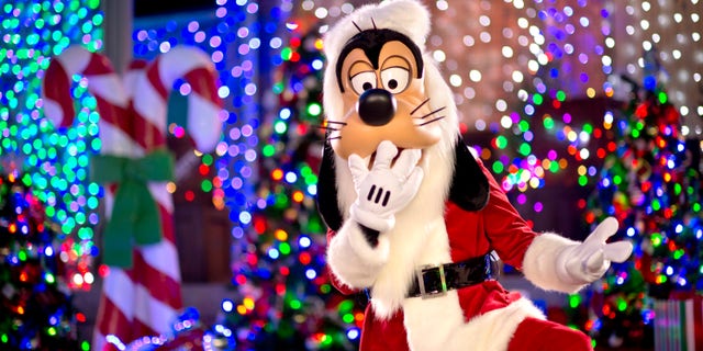 Santa Goofy joins the fun during The Osborne Family Spectacle of Dancing Lights at Disney's Hollywood Studios. Making nightly appearances on the Streets of America, this jovial character greets guests in Goofy's Winter Wonderland. The Osborne Family Spectacle of Dancing Lights sparkles nightly throughout the holiday season at Walt Disney World Resort in Lake Buena Vista, Fla. (Kent Phillips, photographer)