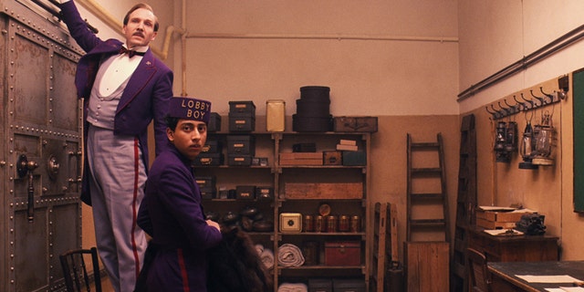 This image released by Fox Searchlight shows Ralph Fiennes, left, and Tony Revolori in "The Grand Budapest Hotel. " The film is nominated for an Oscar Award for best feature. The 87th Annual Academy Awards will take place on Sunday, Feb. 22, 2015 at the Dolby Theatre in Los Angeles. (AP Photo/Fox Searchlight)