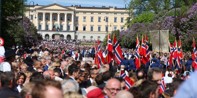 File photo - People gather to take part in the celebration of the Norwegian National Day in the main street of Oslo, in this May 17, 2014 picture provided by NTB Scanpix.