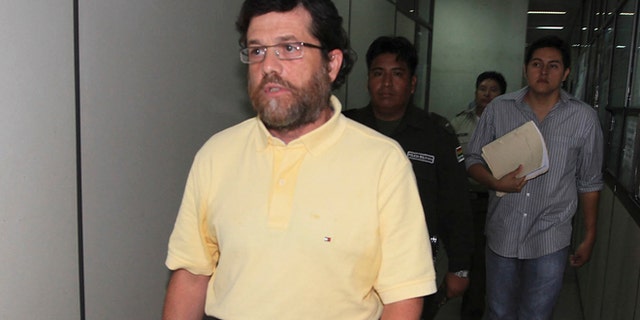 March 21, 2012: Jacob Ostreicher, a New York City businessman, left, arrives at a court to attend a hearing in Santa Cruz, Bolivia.