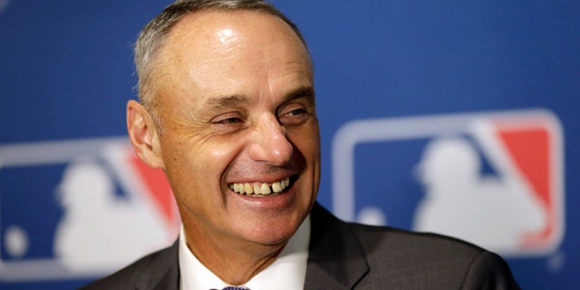 Commissioner of Major League Baseball Rob Manfred speaks during a news conference at a meeting of MLB owners, Thursday, Jan. 21, 2016, in Coral Gables, Fla. Owners held their last meeting before the likely start of collective bargaining, where revenue sharing, the luxury tax, and the international amateur draft are among the topics management may push for change. (AP Photo/Lynne Sladky)