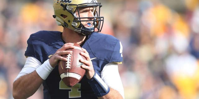 Nov 27, 2015; Pittsburgh, PA, USA; Pittsburgh Panthers quarterback Nathan Peterman (4) looks to pass against the Miami Hurricanes during the first quarter at Heinz Field. Mandatory Credit: Charles LeClaire-USA TODAY Sports