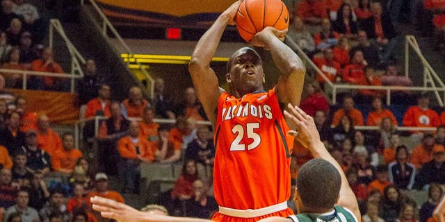 Jan 18, 2014; Champaign, IL, USA; Illinois Fighting Illini guard Kendrick Nunn (25) shoots the ball over Michigan State Spartans guard Alvin Ellis III (3) in the first half of the game at State Farm Center. The Michigan State Spartans beat the Illinois Fighting Illini 78-62. Mandatory Credit: Trevor Ruszkowski-USA TODAY Sports