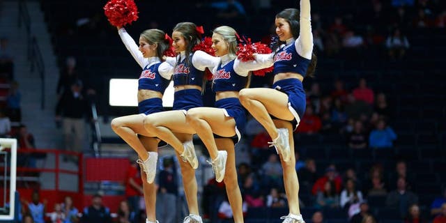 Jan 3, 2015; Oxford, MS, USA; Mississippi Rebels cheerleaders entertain the crowd during the game against the Austin Peay Governors at C.M. Tad Smith Coliseum. Mississippi Rebels defeat the Austin Peay Governors 92-63. Mandatory Credit: Spruce Derden-USA TODAY Sports