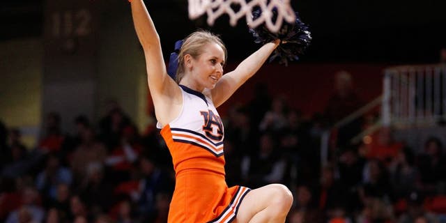 Jan 18, 2014; Auburn, AL, USA; Auburn Cheerleader during the game against the Florida Gators at Auburn Arena. The Gators defeated the Tigers 68-61. Mandatory Credit: Marvin Gentry-USA TODAY Sports