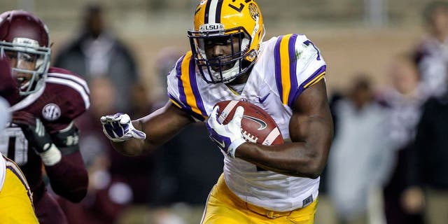 Nov 27, 2014; College Station, TX, USA; LSU Tigers running back Leonard Fournette (7) rushes during the second quarter against the Texas A&M Aggies at Kyle Field. Mandatory Credit: Troy Taormina-USA TODAY Sports