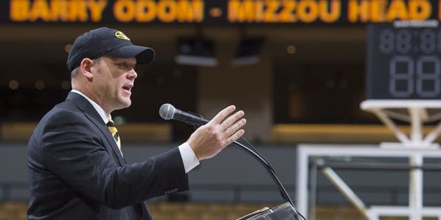 Barry Odom talks to a crowd gathered at Mizzou Arena as he is announced as the new head coach for the NCAA college Missouri football team Friday, Dec. 4, 2015, in Columbia, Mo. (AP Photo/L.G. Patterson)