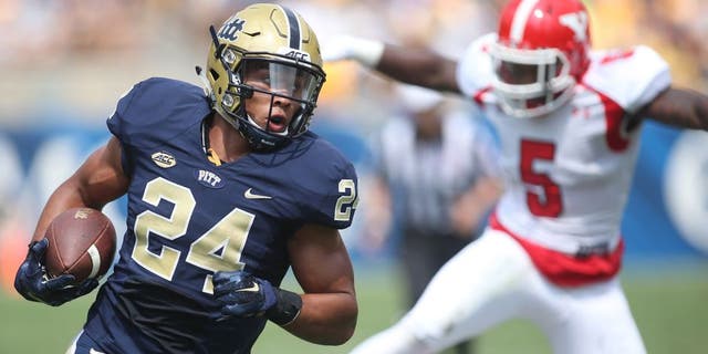 Sep 5, 2015; Pittsburgh, PA, USA; Pittsburgh Panthers running back James Conner (24) carries the ball against the Youngstown State Penguins during the first half at Heinz Field. Mandatory Credit: Charles LeClaire-USA TODAY Sports