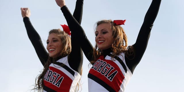 Nov 8, 2014; Lexington, KY, USA; Georgia Bulldogs cheerleaders perform during the game against the Kentucky Wildcats at Commonwealth Stadium. Georgia defeated Kentucky 63-31. Mandatory Credit: Mark Zerof-USA TODAY Sports