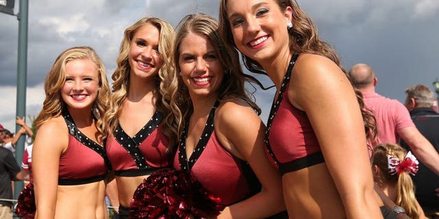Sep 6, 2014; Columbia, SC, USA; South Carolina Gamecocks cheerleaders smile before the game between the South Carolina Gamecocks and East Carolina Pirates at Williams-Brice Stadium. Mandatory Credit: Jim Dedmon-USA TODAY Sports