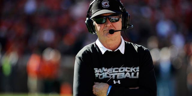 South Carolina head coach Steve Spurrier looks on from the sideline during the first half of an NCAA college football game against Clemson, Saturday, Nov. 29, 2014, in Clemson, S.C. (AP Photo/Rainier Ehrhardt)