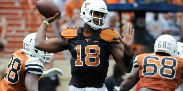 Apr 19, 2014; Austin, TX, USA; Texas Longhorns quarterback Tyrone Swoopes (18) passes the ball during the Spring Game at Texas Memorial Stadium. Mandatory Credit: Brendan Maloney-USA TODAY Sports