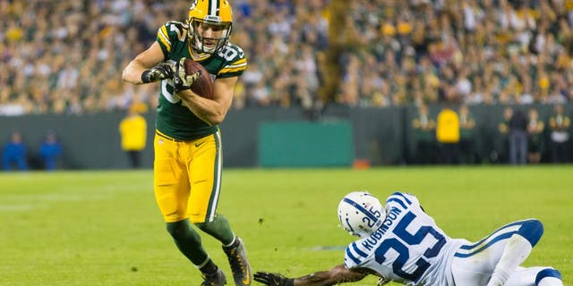 Nov 6, 2016; Green Bay, WI, USA; Green Bay Packers wide receiver Jordy Nelson (87) avoids Indianapolis Colts cornerback Patrick Robinson (25) after catching a pass during the fourth quarter at Lambeau Field. Indianapolis won 31-26. Mandatory Credit: Jeff Hanisch-USA TODAY Sports