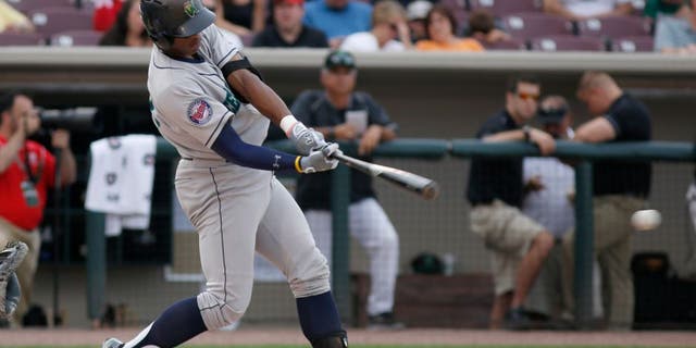 Jun 18, 2013; Dayton, OH, USA; West right fielder Adam Brett Walker bats during the Midwest League-All Star Game at Fifth Third Field. Mandatory Credit: David Kohl-USA TODAY Sports