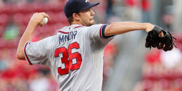 Aug 22, 2014; Cincinnati, OH, USA; Atlanta Braves starting pitcher Mike Minor (36) pitches during the first inning against the Cincinnati Reds at Great American Ball Park. Mandatory Credit: Frank Victores-USA TODAY Sports