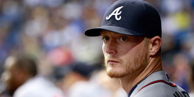 Aug 12, 2015; St. Petersburg, FL, USA; Atlanta Braves pitcher Shelby Miller (17) looks on in the dugout against the Tampa Bay Rays at Tropicana Field. Mandatory Credit: Kim Klement-USA TODAY Sports