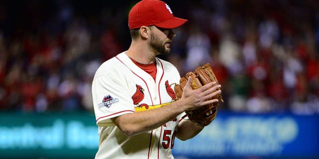 Oct 10, 2015; St. Louis, MO, USA; St. Louis Cardinals pitcher Adam Wainwright (50) reacts after ending the seventh inning in game two of the NLDS against the Chicago Cubs at Busch Stadium. Mandatory Credit: Jeff Curry-USA TODAY Sports