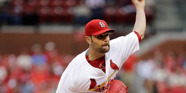 St. Louis Cardinals starting pitcher Jaime Garcia throws during the first inning of a baseball game against the San Francisco Giants, Wednesday, Aug. 19, 2015, in St. Louis. (AP Photo/Jeff Roberson)