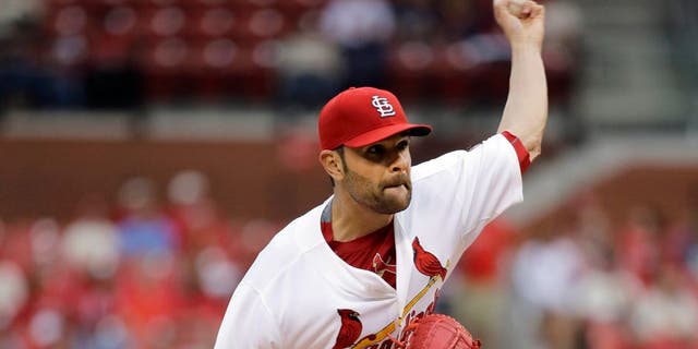 St. Louis Cardinals starting pitcher Jaime Garcia throws during the first inning of a baseball game against the San Francisco Giants, Wednesday, Aug. 19, 2015, in St. Louis. (AP Photo/Jeff Roberson)