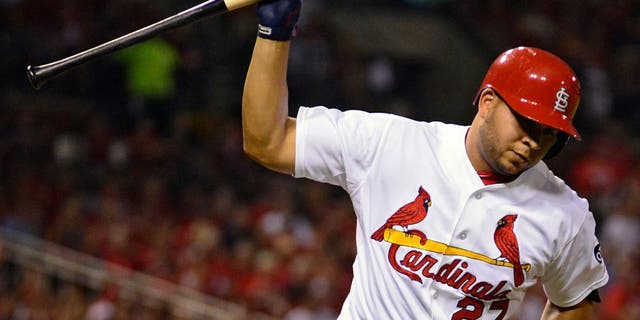 Sep 4, 2015; St. Louis, MO, USA; St. Louis Cardinals shortstop Jhonny Peralta (27) slams his bat after popping out during the first inning against the Pittsburgh Pirates at Busch Stadium. Mandatory Credit: Jeff Curry-USA TODAY Sports