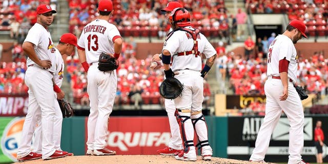 Aug 13, 2015; St. Louis, MO, USA; St. Louis Cardinals starting pitcher Lance Lynn (31) reacts after leaving the game against the Pittsburgh Pirates at Busch Stadium. Mandatory Credit: Jasen Vinlove-USA TODAY Sports