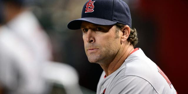 Aug 25, 2015; Phoenix, AZ, USA; St. Louis Cardinals manager Mike Matheny (26) looks on against the Arizona Diamondbacks during the first inning at Chase Field. Mandatory Credit: Joe Camporeale-USA TODAY Sports