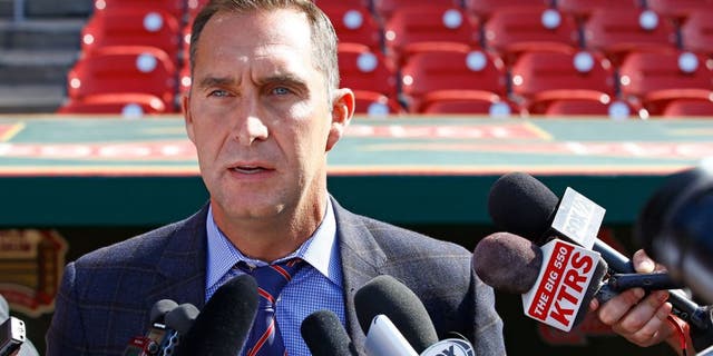 St. Louis Cardinals General Manager John Mozeliak addresses members of the media regarding the condition of Adam Wainwright, prior to a baseball game against the Philadelphia Phillies, Monday, April 27, 2015, in St. Louis. Mozeliak confirmed Wainwright has a torn Achilles and will require season ending surgery. (AP Photo/Billy Hurst)