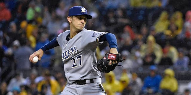 The Milwaukee Brewers' Zach Davies pitches against the Pittsburgh Pirates in the first inning Saturday, Sept. 12, 2015, in Pittsburgh.