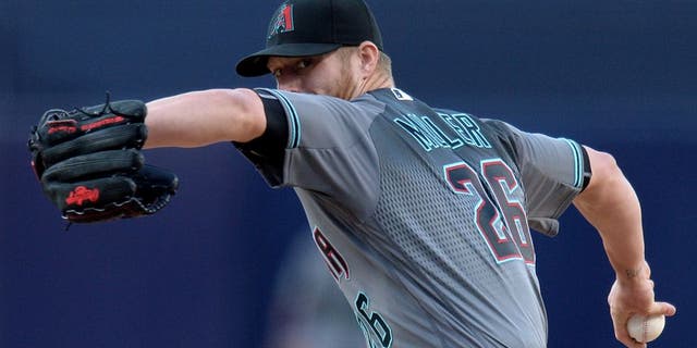 Apr 16, 2016; San Diego, CA, USA; Arizona Diamondbacks starting pitcher Shelby Miller (26) throws the ball during the first inning against the San Diego Padres at Petco Park. Mandatory Credit: Jake Roth-USA TODAY Sports