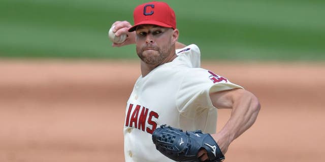 Cleveland Indians starting pitcher Corey Kluber delivers in the sixth inning against the Minnesota Twins at Progressive Field on Sunday, August 9, 2015.
