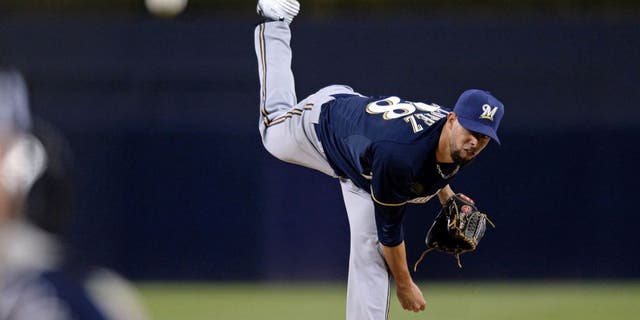 Milwaukee Brewers starting pitcher Jorge Lopez pitches during the first inning of his major league debut against the San Diego Padres at Petco Park on Tuesday, Sept. 29, 2015.