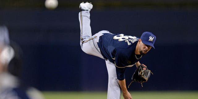 Milwaukee Brewers starting pitcher Jorge Lopez pitches during the first inning of his major league debut against the San Diego Padres at Petco Park on Tuesday, Sept. 29, 2015.