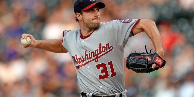 Aug 20, 2015; Denver, CO, USA; Washington Nationals starting pitcher Max Scherzer (31) delivers a pitch in the first inning against the Colorado Rockies at Coors Field. Mandatory Credit: Ron Chenoy-USA TODAY Sports