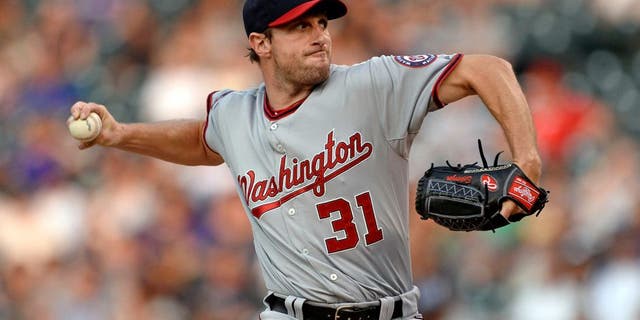Aug 20, 2015; Denver, CO, USA; Washington Nationals starting pitcher Max Scherzer (31) delivers a pitch in the first inning against the Colorado Rockies at Coors Field. Mandatory Credit: Ron Chenoy-USA TODAY Sports