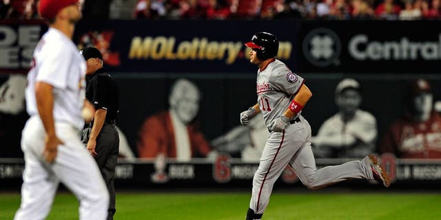 Sep 2, 2015; St. Louis, MO, USA; Washington Nationals first baseman Ryan Zimmerman (11) runs the bases after hitting his second solo home run off of St. Louis Cardinals starting pitcher Tyler Lyons (70) during the sixth inning at Busch Stadium. Mandatory Credit: Jeff Curry-USA TODAY Sports