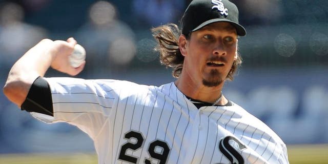 Chicago White Sox starting pitcher Jeff Samardzija throws against the Minnesota Twins during the first inning of a baseball game, Saturday, April 11, 2015 in Chicago.