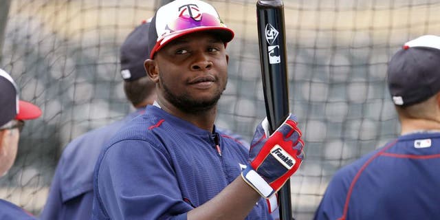 The Minnesota Twins' Miguel Sano waits to bat before a game against the Houston Astros in Minneapolis on Friday, Aug. 28, 2015.