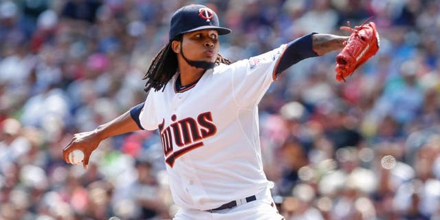 Minnesota Twins starting pitcher Ervin Santana pitches to the Houston Astros in the first inning at Target Field on Sunday, Aug. 30, 2015.
