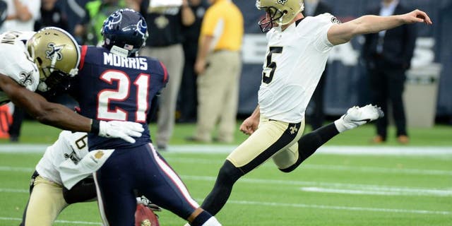 FILE - In this Nov. 29, 2015, file photo, then-New Orleans Saints kicker Kai Forbath (5) kicks a 57-yard field goal during the second quarter of an NFL football game against the Houston Texans, in Houston. Another loss has triggered another round of changes for Minnesota, with new kicker Kai Forbath leading the list as the Vikings try to stop their freefall by letting the struggling Blair Walsh go.(AP Photo/George Bridges, File)