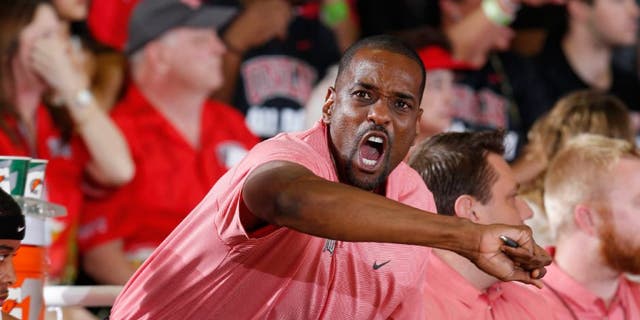 UNLV Runnin Rebels assistant coach Stacey Augmon coaching on the sidelines against the UCLA Bruins at the Lahaina Civic Center during the Maui Jim Maui Invitational.