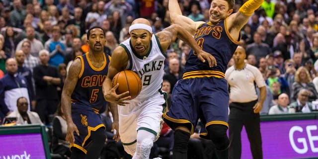 Milwaukee Bucks guard Jerryd Bayless dribbles the ball during the first overtime period against the Cleveland Cavaliers at BMO Harris Bradley Center. The Bucks won 108-105 in double overtime.