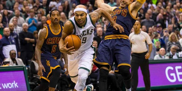 Milwaukee Bucks guard Jerryd Bayless dribbles the ball during the first overtime period against the Cleveland Cavaliers at BMO Harris Bradley Center. The Bucks won 108-105 in double overtime.