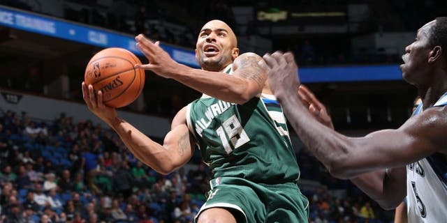 The Milwaukee Bucks' Jerryd Bayless shoots the ball against the Minnesota Timberwolves during a preseason game on Oct. 23, 2015, at Target Center in Minneapolis.
