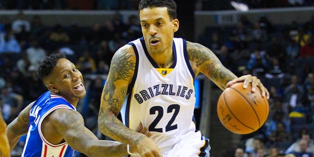 Nov 29, 2015; Memphis, TN, USA; Memphis Grizzlies forward Matt Barnes (22) drives against Philadelphia 76ers guard Isaiah Canaan (0) in the first half at FedExForum. Mandatory Credit: Nelson Chenault-USA TODAY Sports
