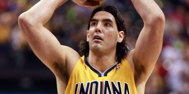 Indiana Pacers forward Luis Scola shoots a free throw against the Chicago Bulls in the second half of an NBA basketball game in Indianapolis, Friday, March 21, 2014. Indiana won 91-79. (AP Photo/R Brent Smith)