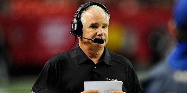 Dec 15, 2013; Atlanta, GA, USA; Atlanta Falcons head coach Mike Smith shown on the sideline against the Washington Redskins during the second half at the Georgia Dome. The Falcons defeated the Redskins 27-26. Mandatory Credit: Dale Zanine-USA TODAY Sports