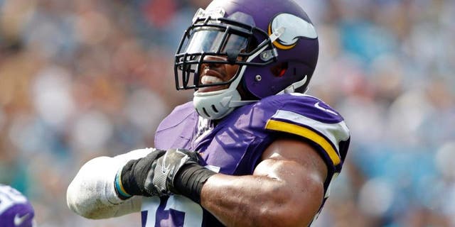 The Minnesota Vikings' Anthony Barr celebrates after a sack against the Carolina Panthers in the second half in Charlotte, N.C., Sunday, Sept. 25, 2016.