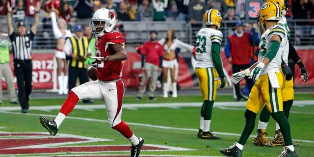 Arizona Cardinals wide receiver John Brown scores a touchdown against the Green Bay Packers during the first half Sunday, Dec. 27, 2015, in Glendale, Ariz.
