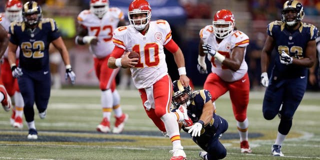 Kansas City Chiefs quarterback Chase Daniel scrambles for a 14-yard gain during the second quarter of an NFL preseason football game against the St. Louis Rams Thursday, Sept. 3, 2015, in St. Louis. (AP Photo/Tom Gannam)