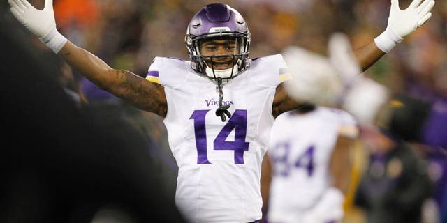The Minnesota Vikings' Stefon Diggs celebrates during the second half against the Green Bay Packers on Sunday, Jan. 3, 2016, in Green Bay, Wis.
